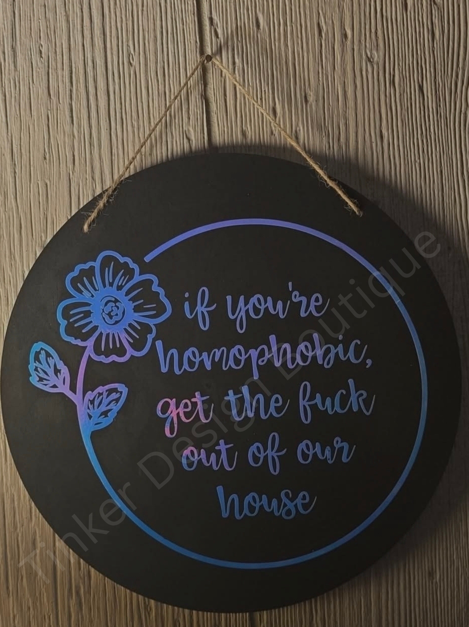 GTFO Homophobes sign